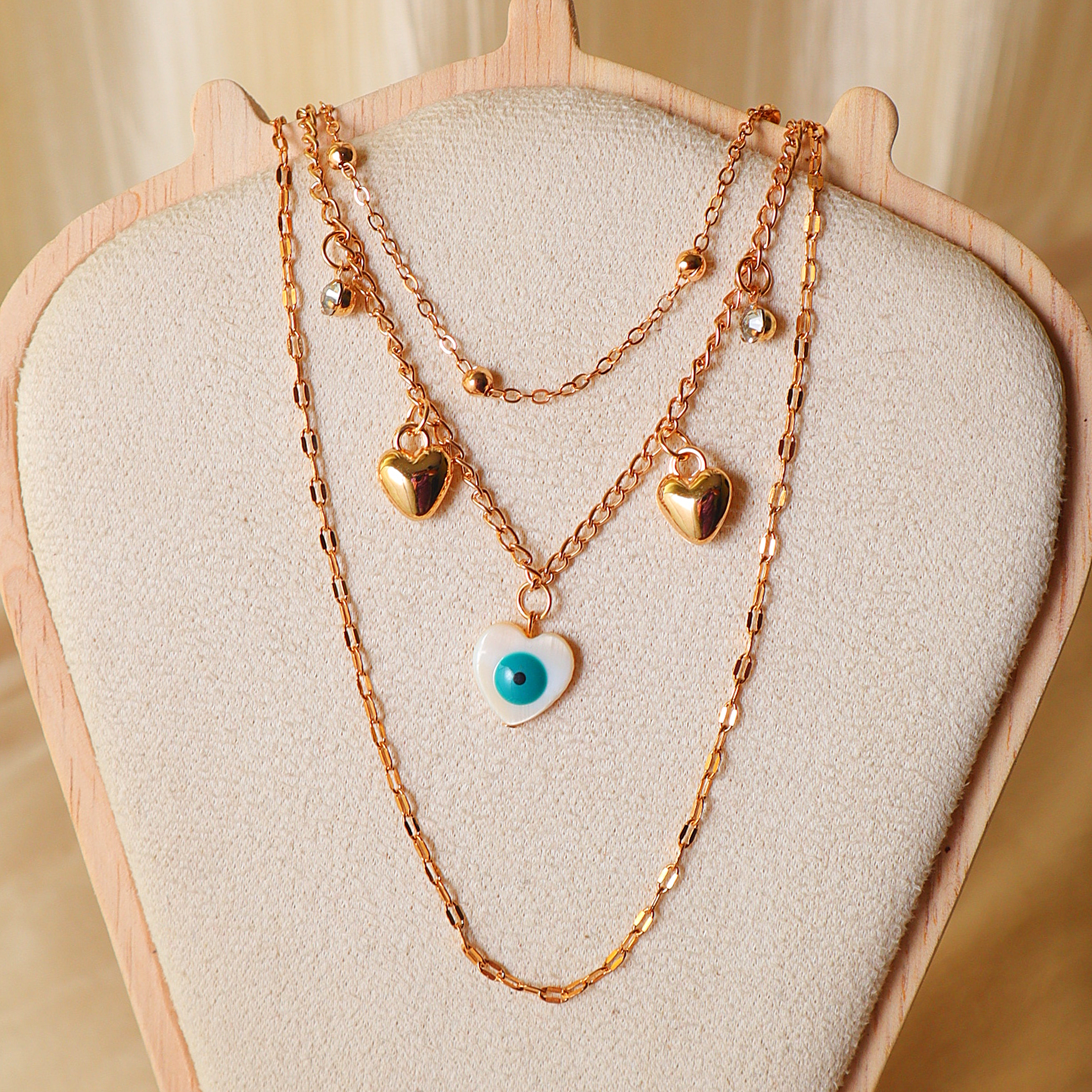 Gold Layered Necklace Set for Women – 3-Piece Evil Eye Heart Charm & Bead Chain Combo