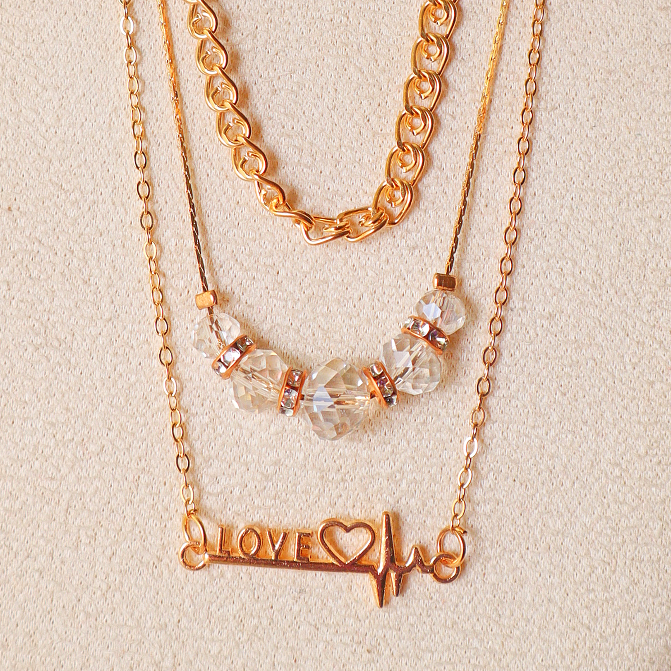 Gold Layered Necklace Set for Women – 3-Piece Love Heartbeat Charm & Crystal Bead Chain Combo
