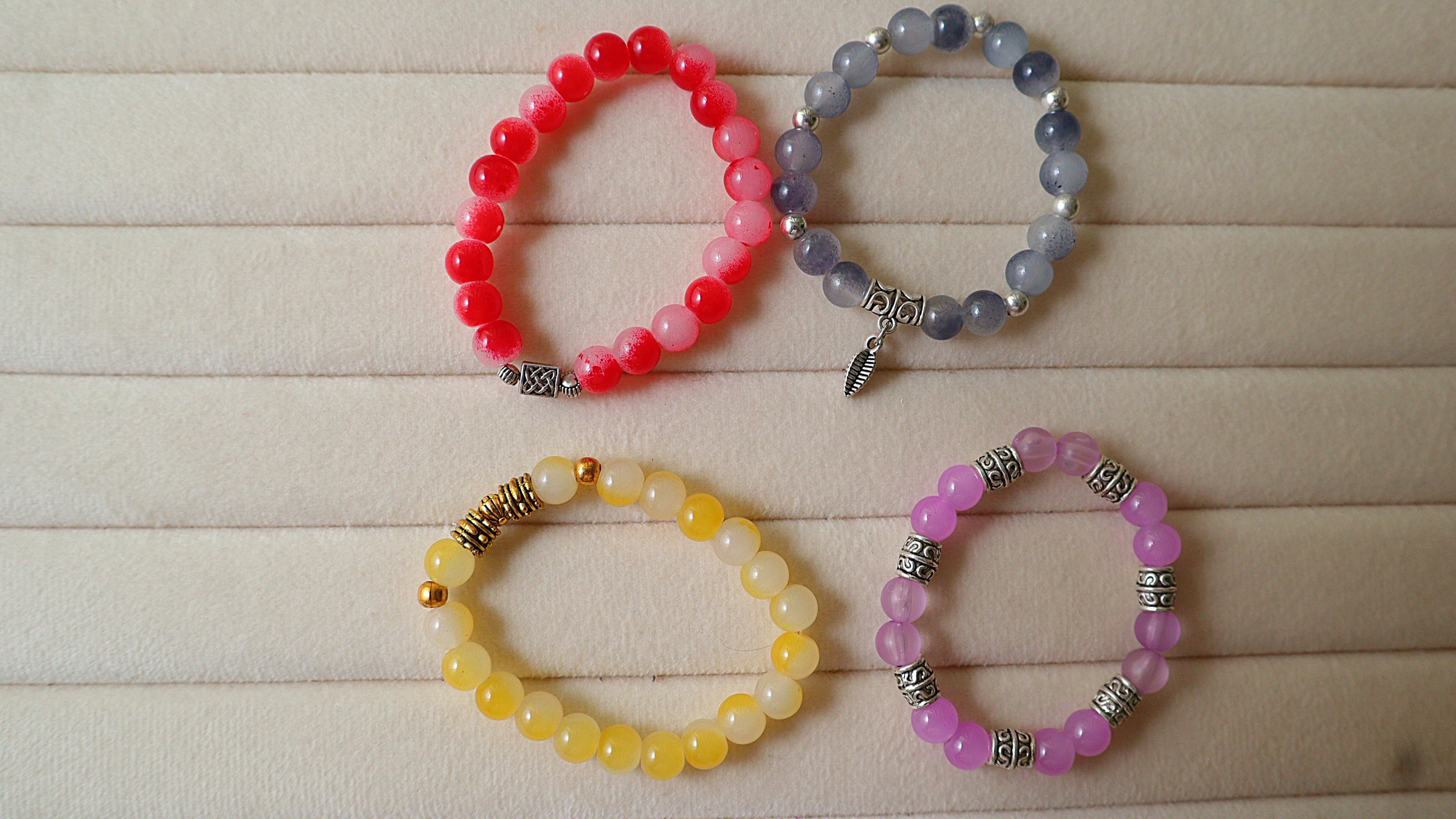 4-Pack Handmade Beaded Stretch Bracelets | Red Marbled, Smoky Blue, Honey Yellow & Lavender
