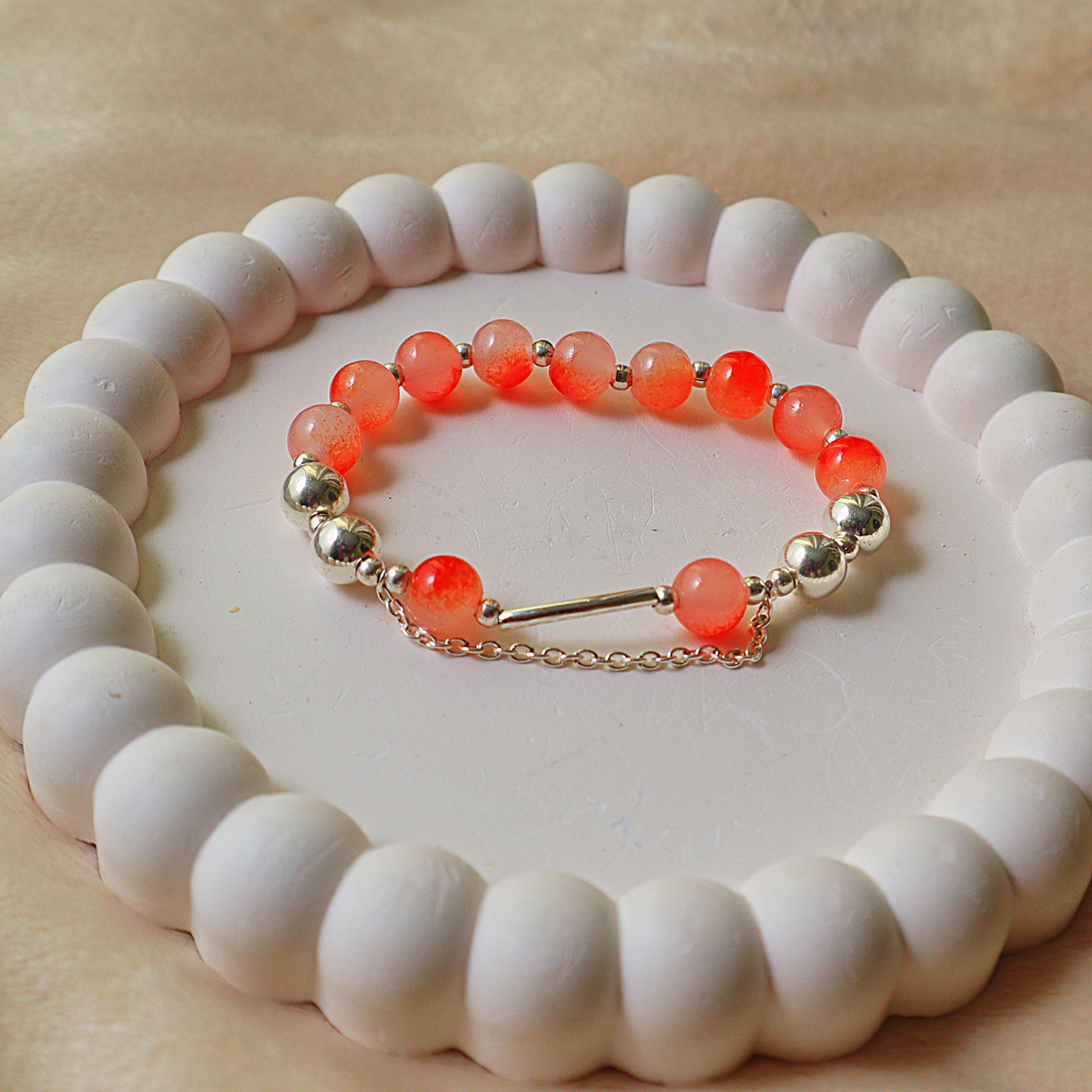 Sunset Coral Crackle Glass Bead Bracelet – Silver Metallic Beads, Curved Tube Connector & Chain Drape