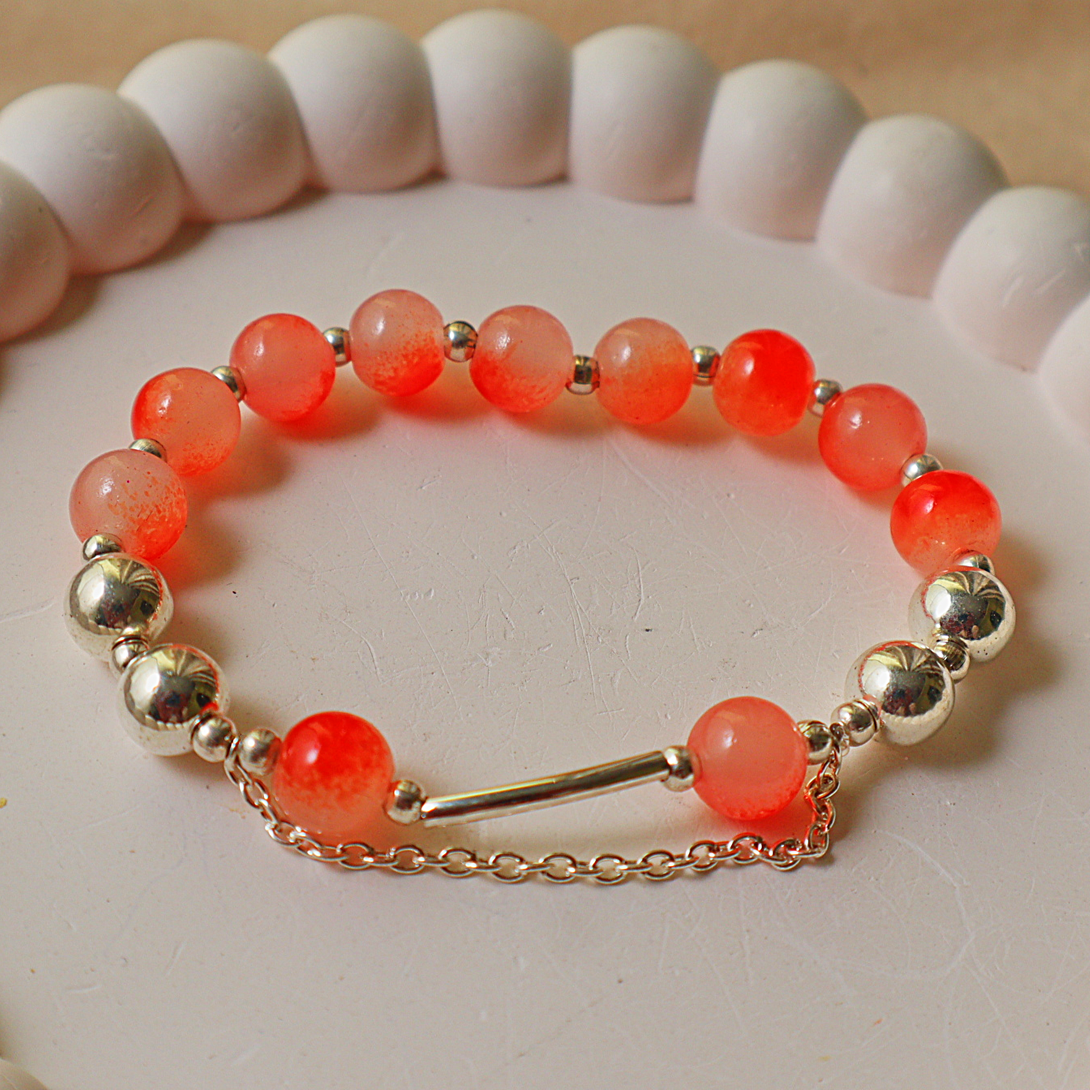 Sunset Coral Crackle Glass Bead Bracelet – Silver Metallic Beads, Curved Tube Connector & Chain Drape