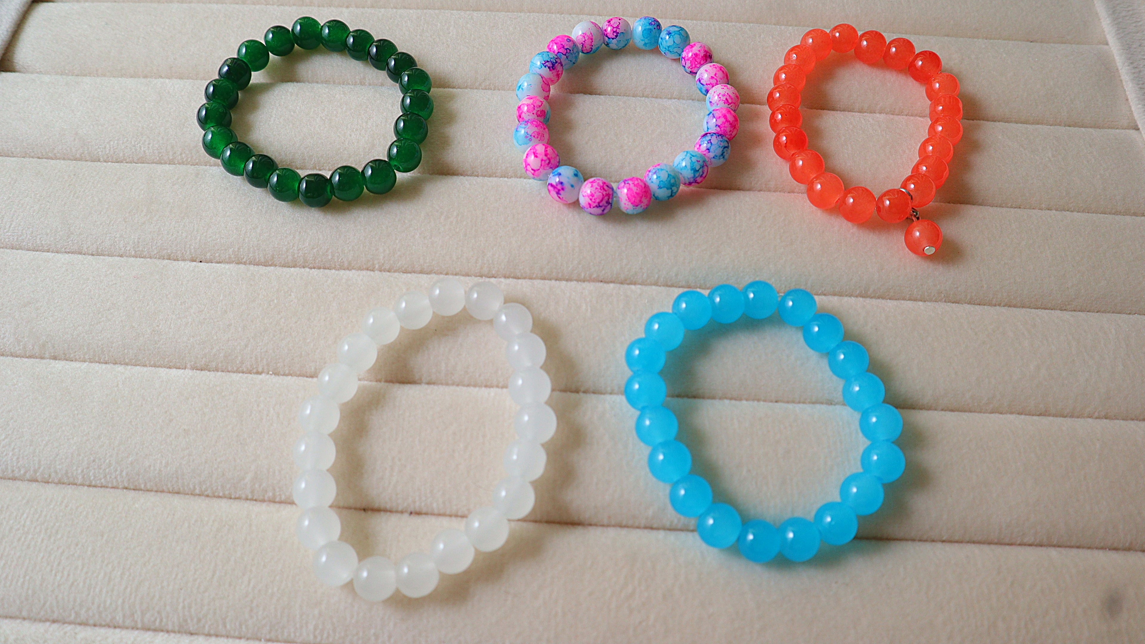 5-Pack Handmade Beaded Bracelets | Emerald Green, Pink Blue Splatter, Tangerine, White & Sky Blue
