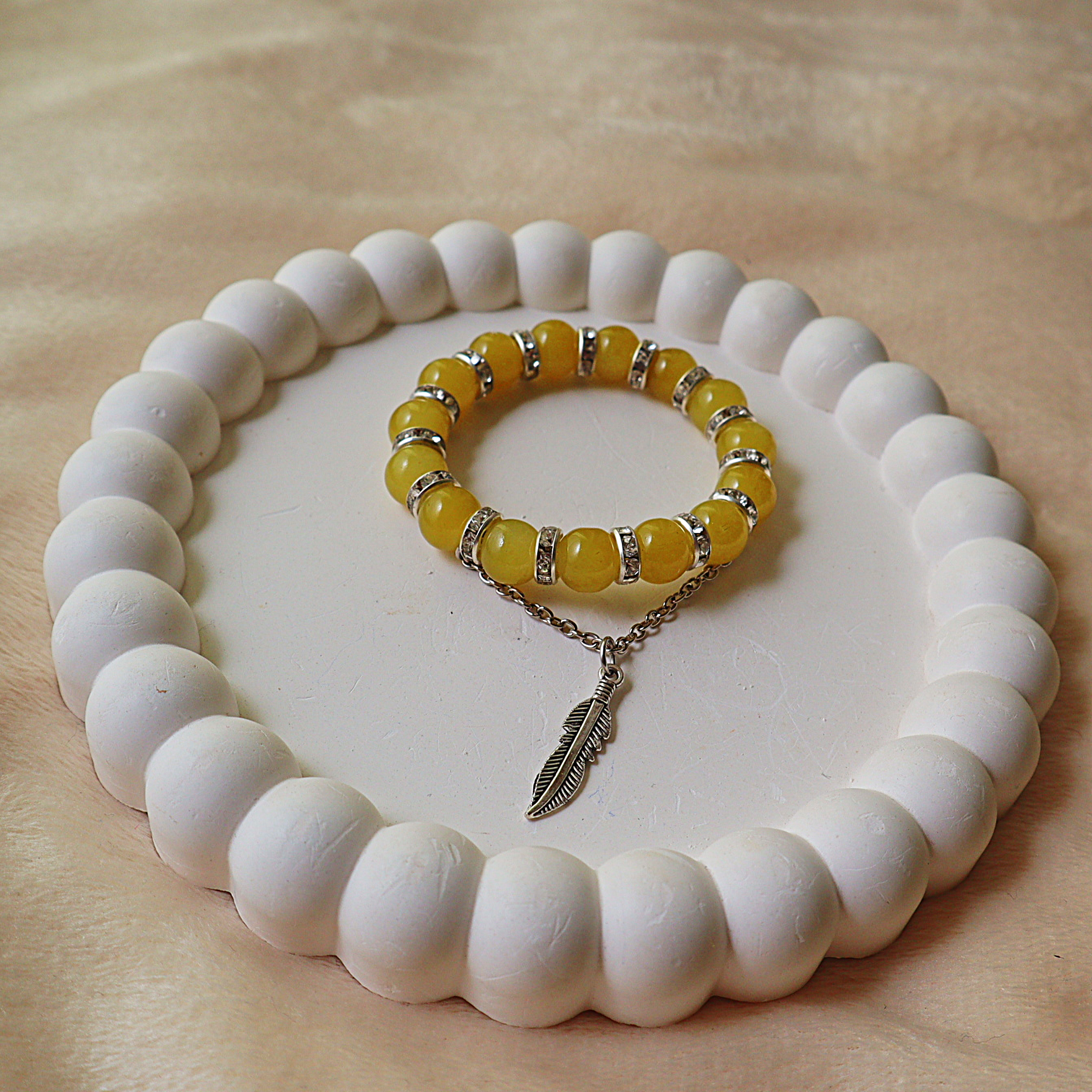 Honey Yellow Glass Bead Bracelet – Silver Rhinestone Spacers & Draping Feather Charm