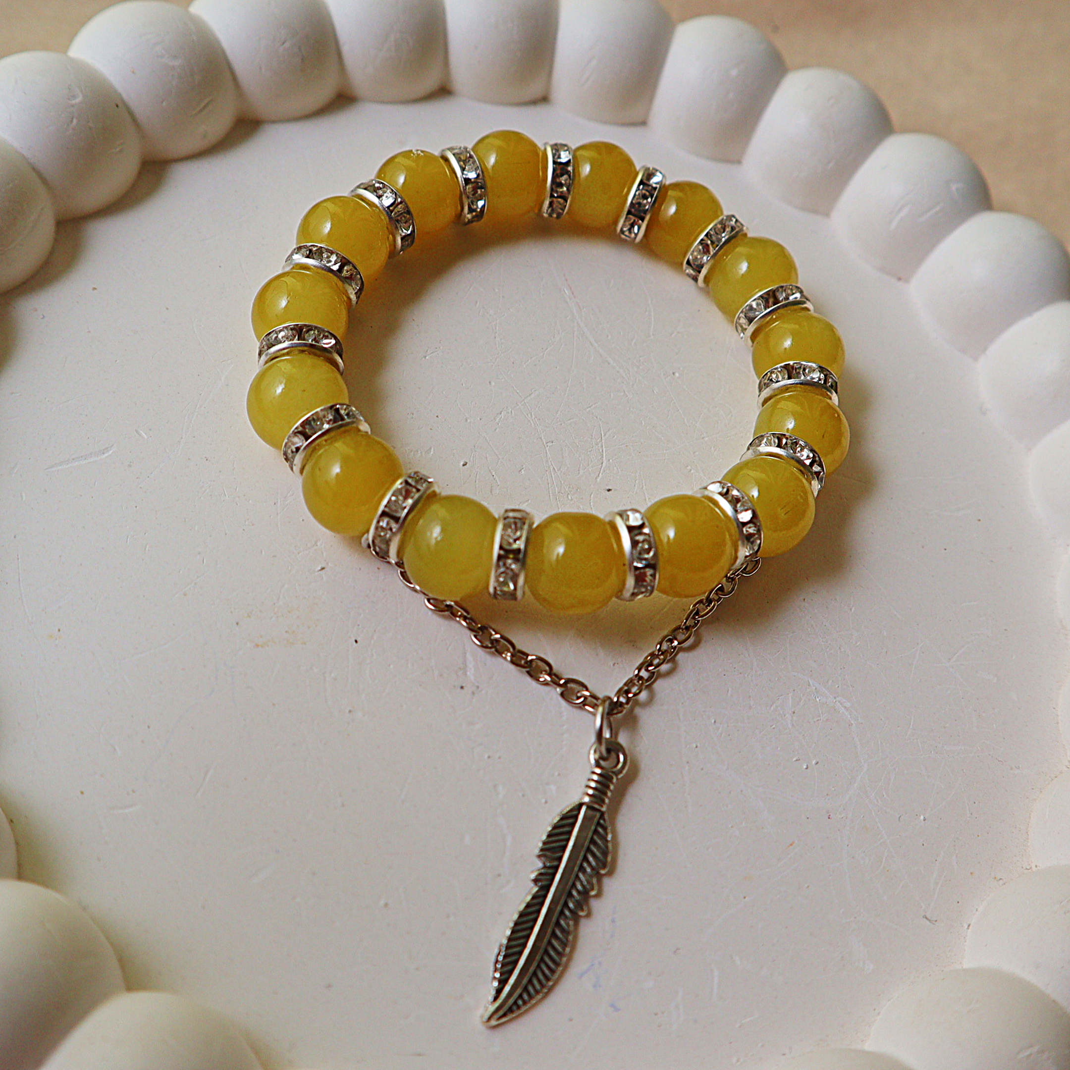 Honey Yellow Glass Bead Bracelet – Silver Rhinestone Spacers & Draping Feather Charm