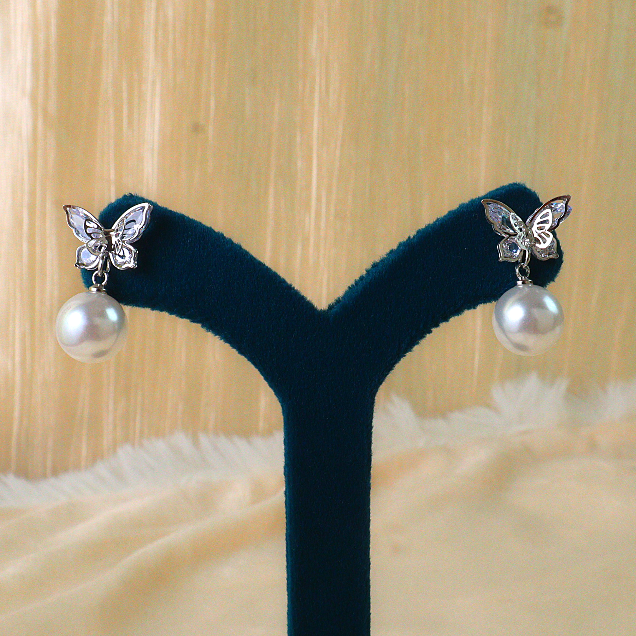 Silver Butterfly Pearl Drop Designer Earrings