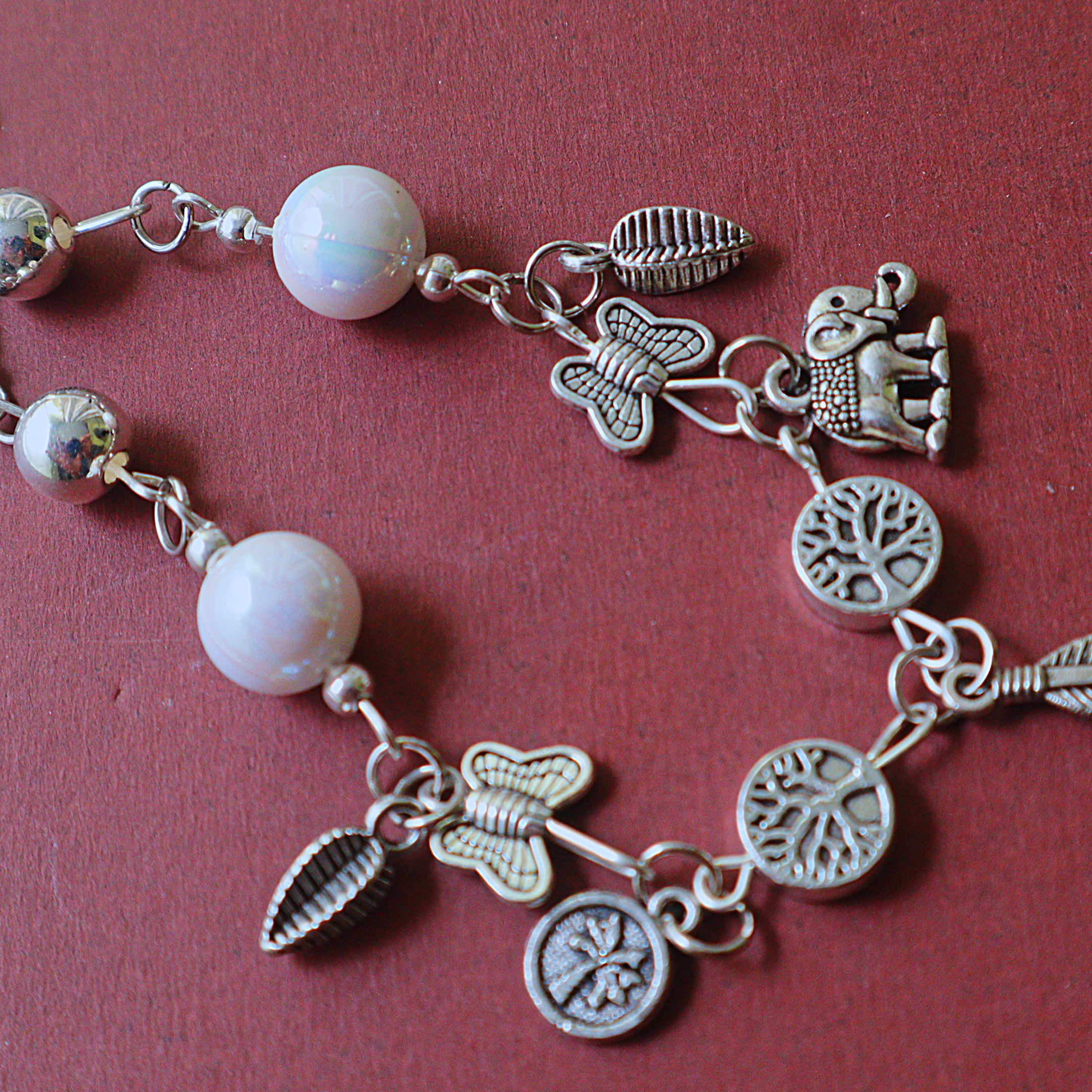 Handmade Silver Multi-Charm Chain Link Bracelet with Iridescent Pearl Glass Beads