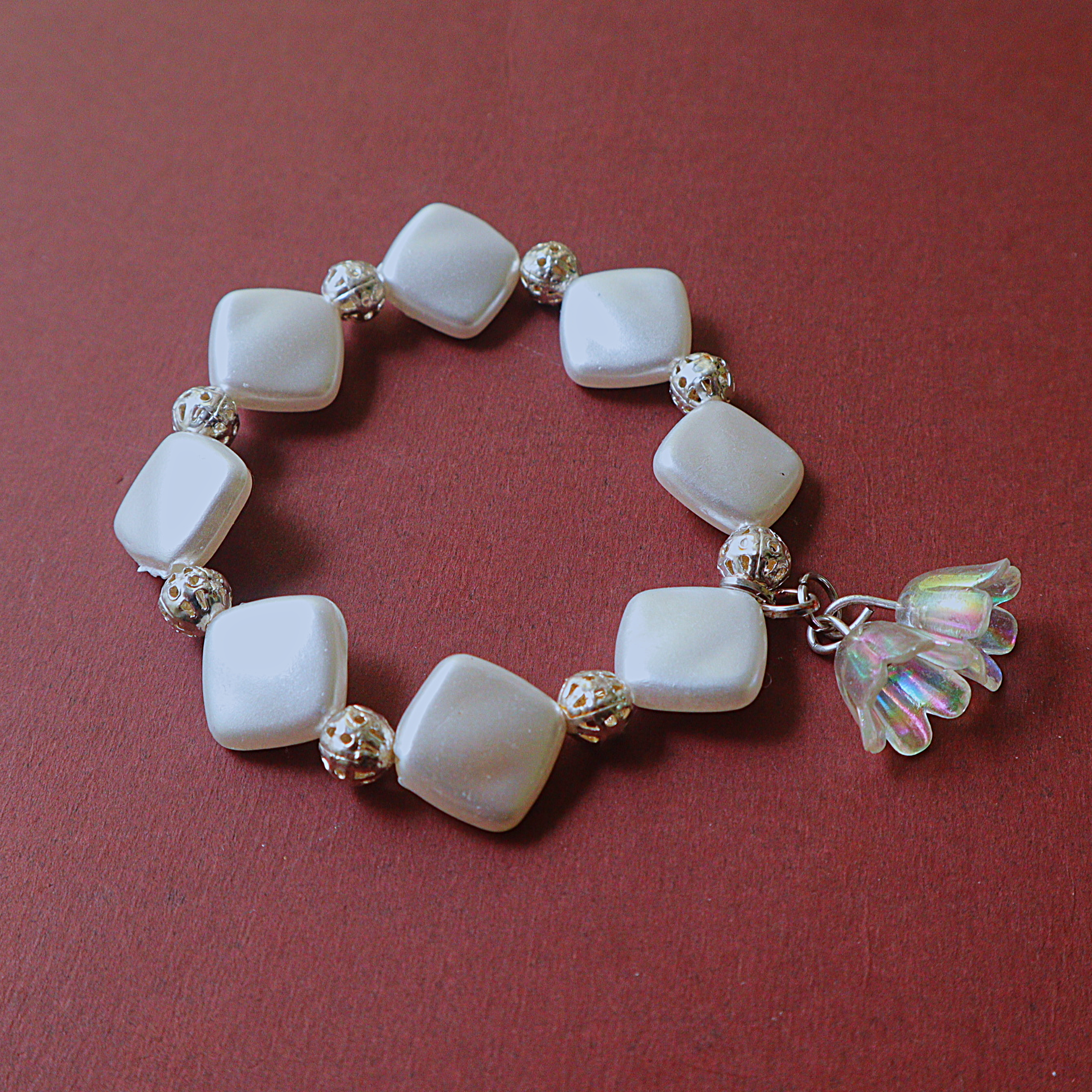 Handmade White Pearlescent Square Bead Bracelet with Filigree Spacers & Lily Charm