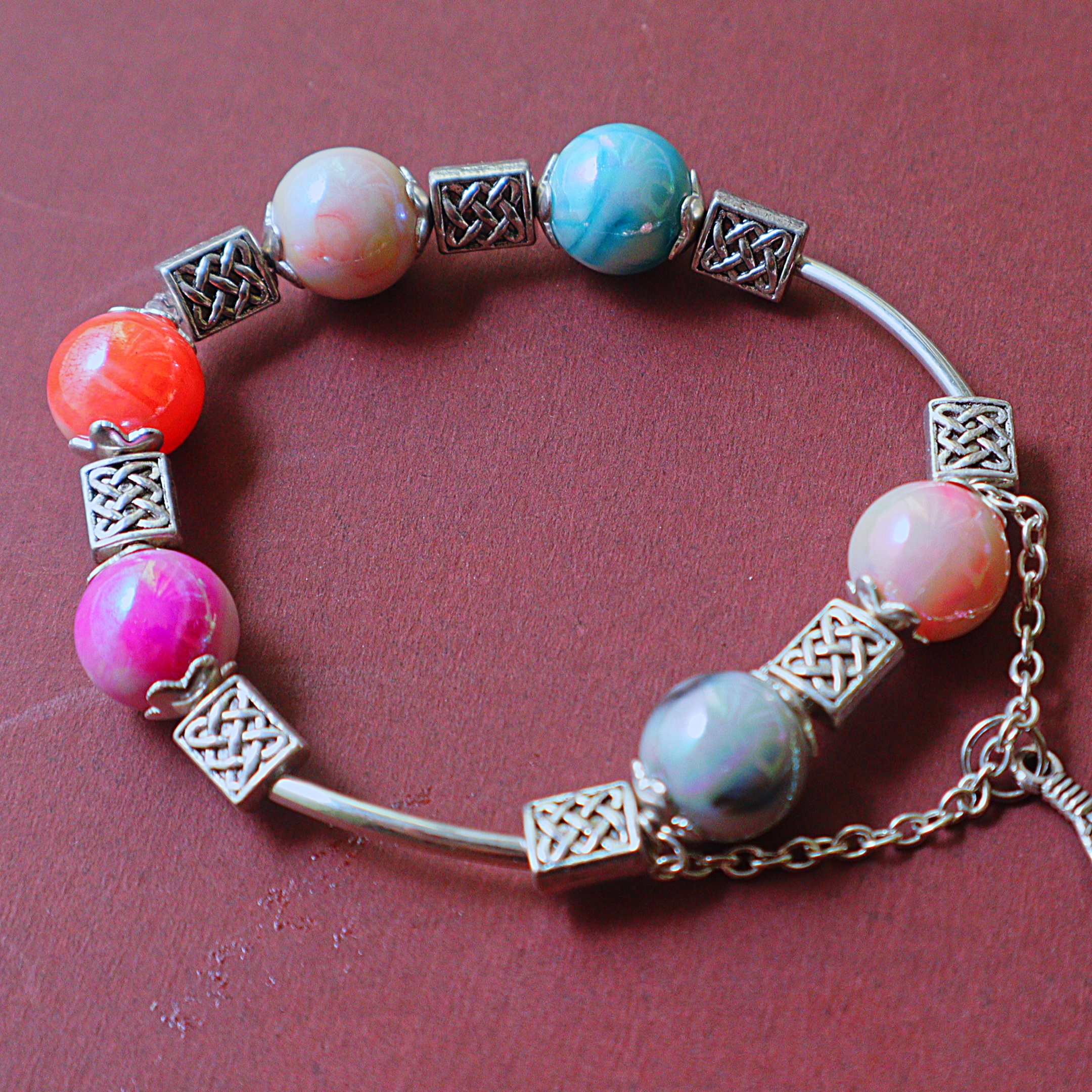 Handmade Multi-Color Marbled Bead Bangle Bracelet with Celtic Knot Spacers & Feather Charm
