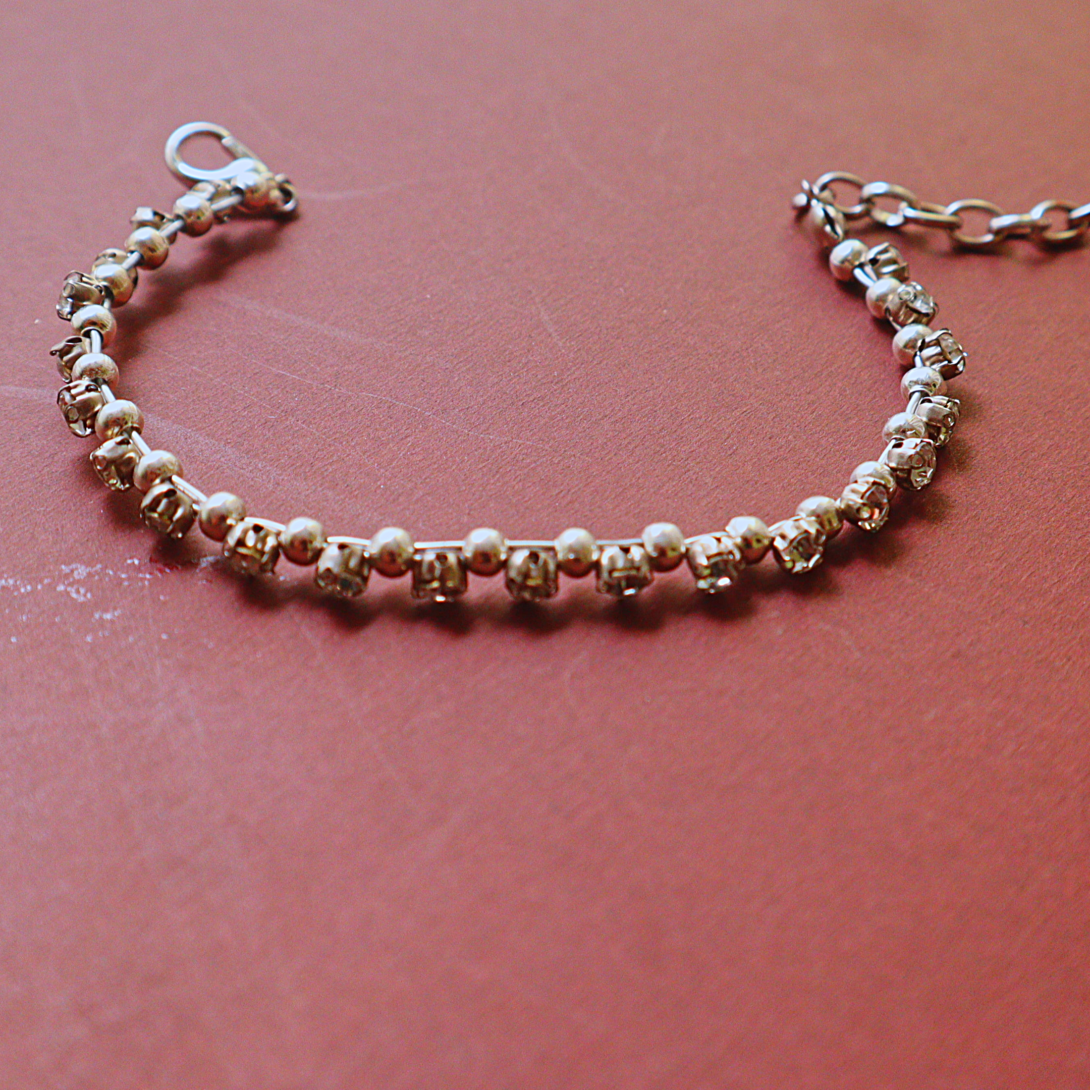 Handmade Gold Rhinestone Tennis Bracelet with Beaded Spacer Accents
