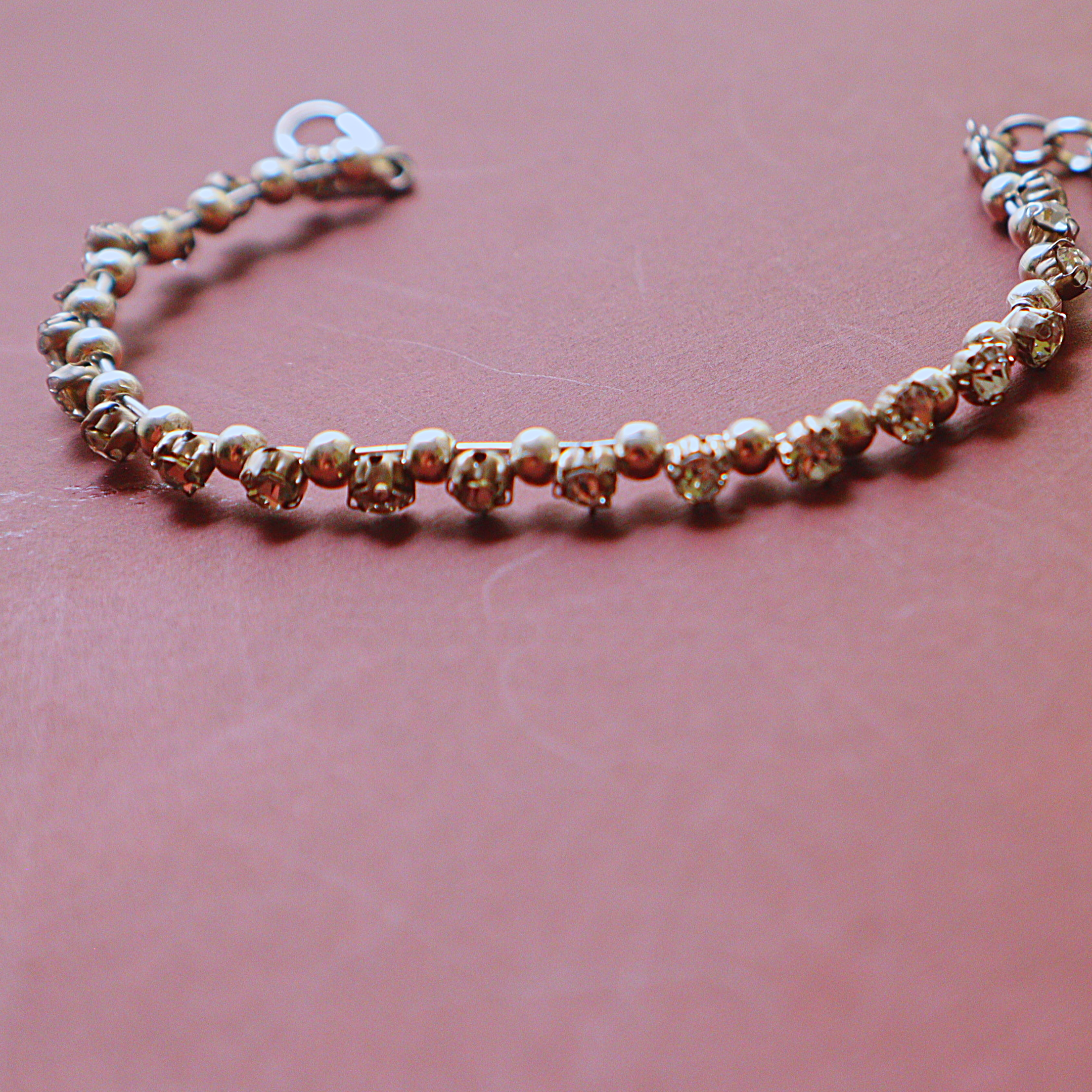 Handmade Gold Rhinestone Tennis Bracelet with Beaded Spacer Accents