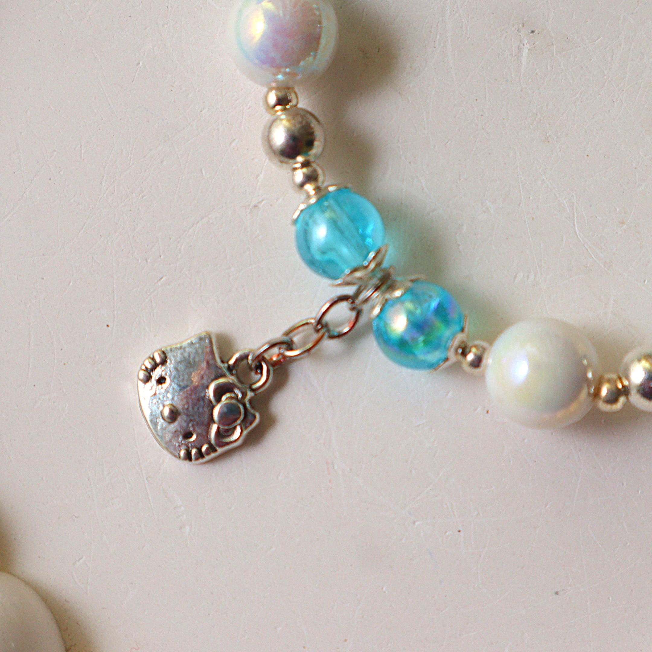 Iridescent Blue & Pearl Beaded Bracelet with Kitty Charm